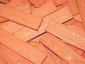 cales en bois droul, longueur 70 mm, largeur 15 mm, p. 3 mm, coloris orange x 1000