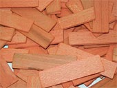 cales en bois droul, longueur 70 mm, largeur 18 mm, p. 3 mm, coloris orange x 1000